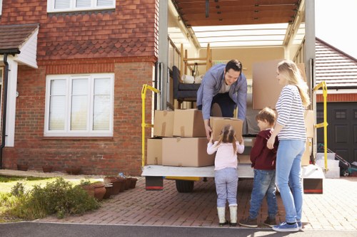 Office furniture removal service for a business premises in Swisscottage