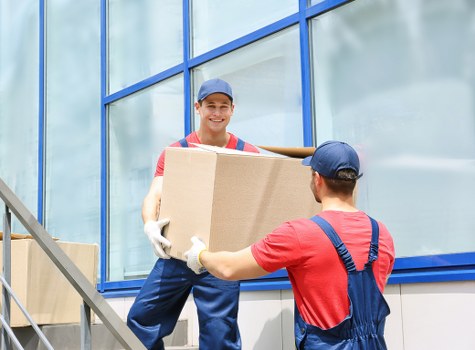 Professional removalists managing furniture in Swisscottage