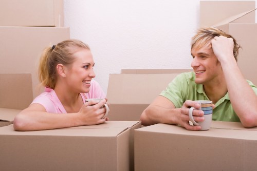Careful unloading of belongings at a Swisscottage property