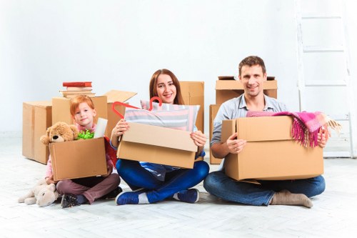 Careful packing and wrapping of household items for a Swiss Cottage move