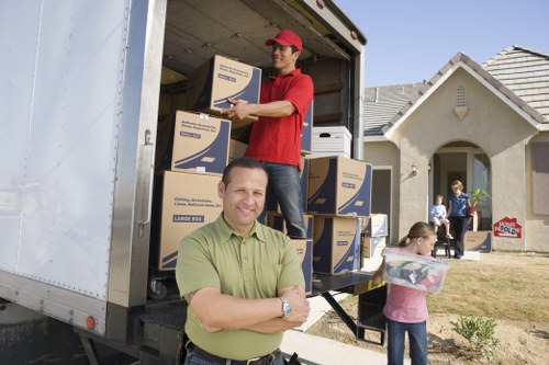 Removal team handling boxes during a UK move