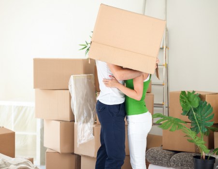 Furniture and boxes loaded into a van for transport in Swisscottage