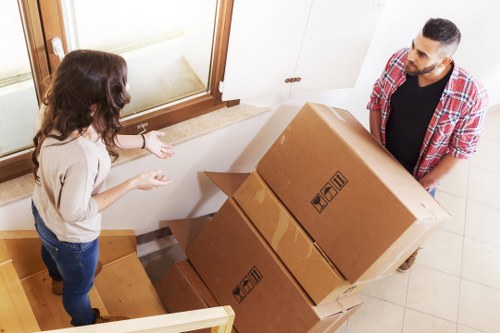 Business move checklist and labelled office crates for relocation