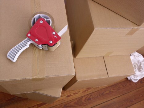 Loading furniture and boxes into a removal van for a local move